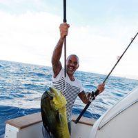 Christian Audigier catches a huge fish with his girlfriend Nathalie Sorensen | Picture 124257